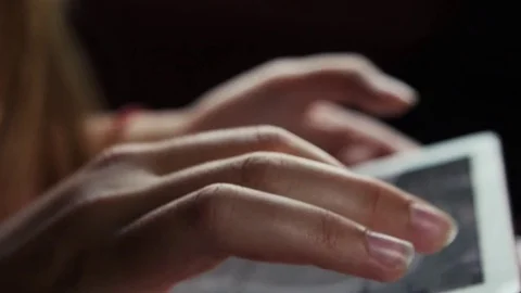 Womens hands use a tablet Stock Footage 80015873