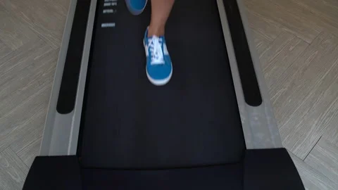 Women's legs on a treadmill Video stock 91581692