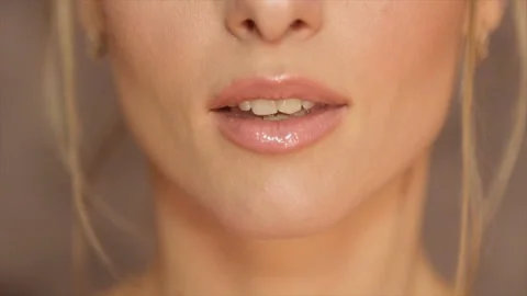 Women's lips, painted with light pomade Stock Footage 87278045