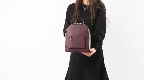 Women's red leather backpack front view. The trendy purse for office, busines Stock Photos