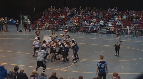 Women's Roller Derby - Wide, High Angle Stock Footage