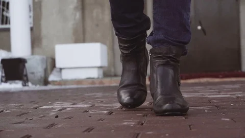 Women's shoes close up go to the camera forward on the brickwork. Video stock 105226261