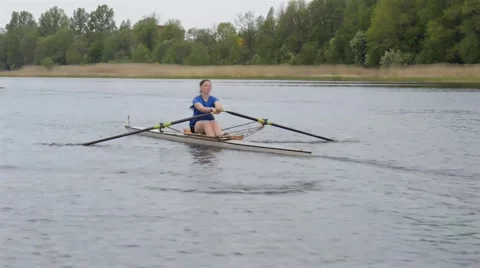 Womens single scull rowing competition Stock Footage 40340768