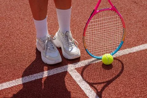 Women's Tennis Training Session with Racket and Ball on Court Stock Photos