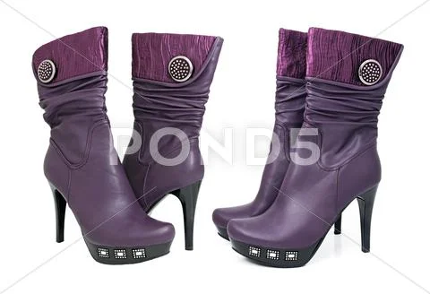 Women's winter boots isolated on a white background Stock Photos