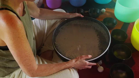 Wonan's Hands playing on ocean drum in the gazebo. Healing medicine and med.. Stock Footage 341232537