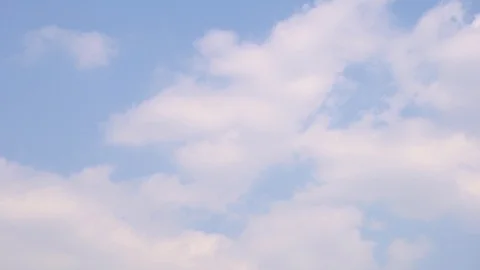Wonderful beautiful white fluffy clouds Plane flies through the clouds TimeLapse Stock Footage 120698853