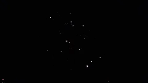 Wonderful bright colourful firework explosion dark night sky over big city 動画素材 147371430