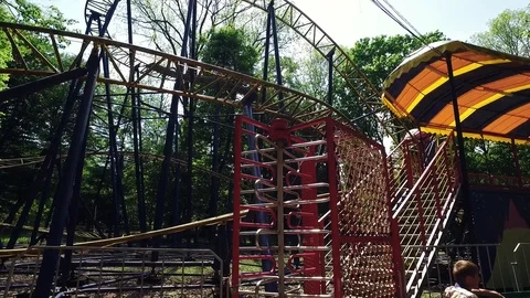 Wonderful construction of empty roller coaster. Amusement park. Attractive 스톡 동영상 108850746