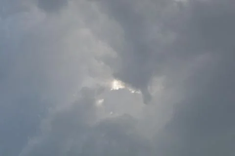 Wonderful dramatic clouds formation at the sky Stock Photos