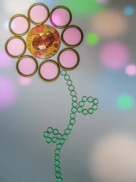 Wonderful flower from round elements on a background with confetti 写真素材