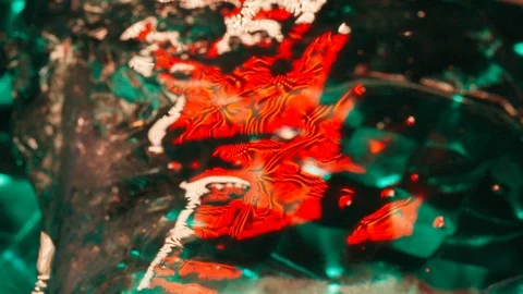 Wonderful lights through transparent icecube Stock Footage 125299398