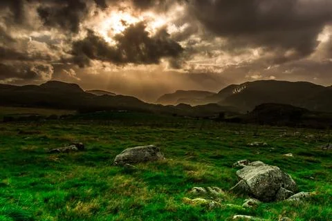 Wonderful nature background in mountains. Green fields landscape. view in t.. Stock Photos