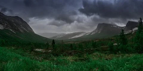 Wonderful nature background in mountains. Green fields landscape. view in t.. Stock Photos