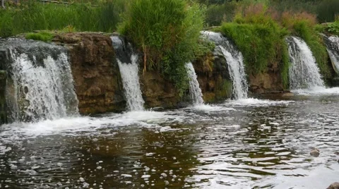 Wonderful seascape with a  waterfall Stock Footage 52804260