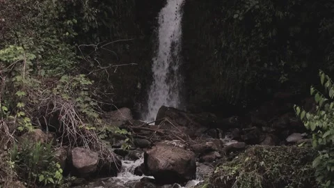 A wonderful small cascade waterfall slow running waters. HD. Stock Footage 138716692