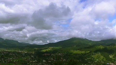 Wonderful  Solar clouds over  mountain village. Beautiful landscape Stock Footage 41633504
