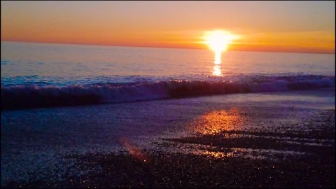 Wonderful sunset on the beach 4k Stock Footage 104442425
