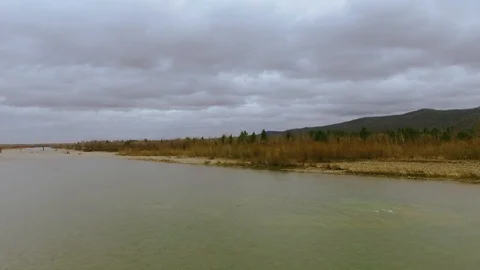 Wonderful view of cold river. Spring time. Cloudy weather. Outdoors. Drone 스톡 동영상 105367466