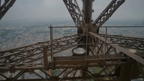 Wonderful view of Paris from moving Eiffel Tower Lift Stock Footage 75826174