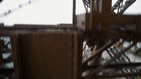 Wonderful view of Paris from moving Eiffel Tower Lift Stock Footage 76446608
