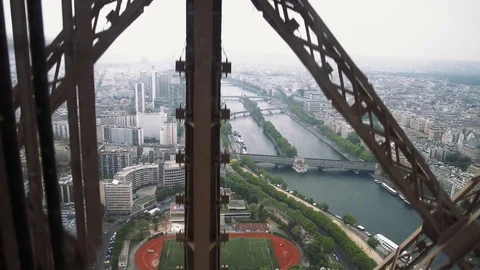 Wonderful view of Paris from moving Eiffel Tower Lift Stock Footage 76446960