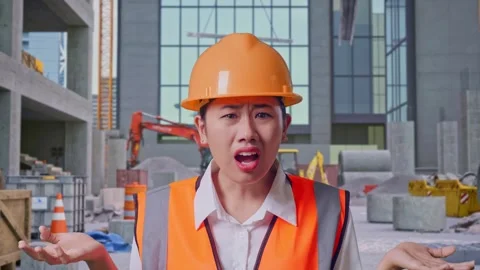 Wondering Engineer Saying Why Working Doubtfully at Construction Site Stock Footage 325857220
