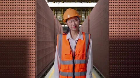 Wondering Female Engineer Working Doubtfully With Brick In Stacks Stock Footage 303761646