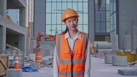 Wondering Female Engineer Working Doubtfully at Construction Site Stock Footage 325856177