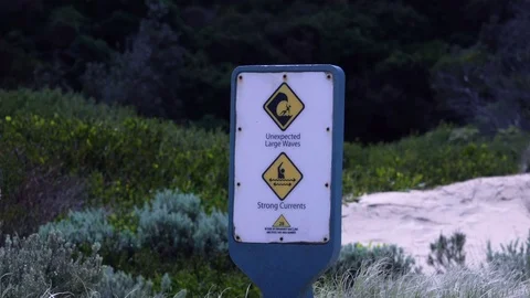 Wonthaggi, Australia: Security Sign. Unexpected Large Waves Stock Footage 69968319