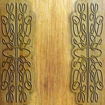 Wood background with celtic pattern Fotos de archivo