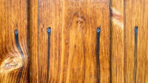 Wood Background Texture. Rustic weathered barn wood background with knots and Stock Photos