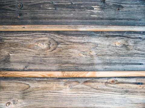 Wood Background Texture. Rustic weathered barn wood background with knots and Stock Photos