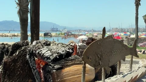 Wood barbeque getting ready at a fish grilling stall by the beach in Malaga Video stock 338158951