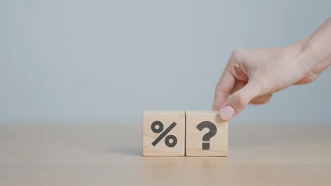 Wood block of Question mark and Percentage. Interest rate, GDP, stocks mark.. Stock Footage 285485958