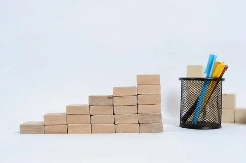Wood block stacking as step stair on wooden table. Business concept for growt Stock Photos