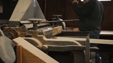 Wood board going through planer machine Stock Footage 102044997