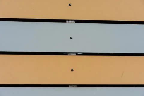 Wood board installation wall with different colours abstract front view Stock Photos