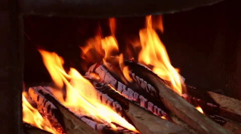 Wood burning on dark background. Fire and flame Stock Footage 36776669