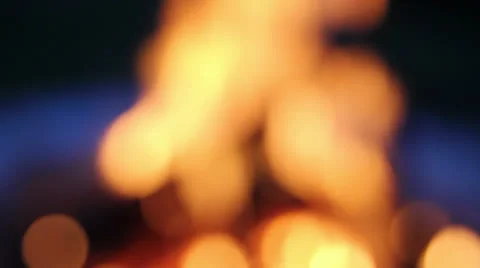 Wood Burning Fire Pit with Orange Flames Bokeh 1080p Stock Footage 27086576