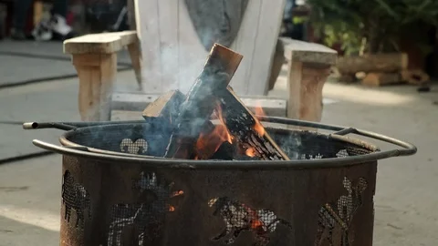 Wood burning fire pit. Slow Motion 4K. Stock Footage 100003394