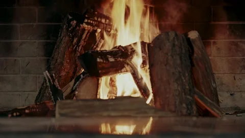 Wood is burning in the fireplace Stock Footage 305275290