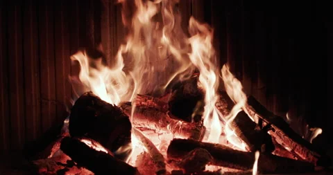 The wood is burning in the fireplace. Slow-motion 120 fps video Stock Footage