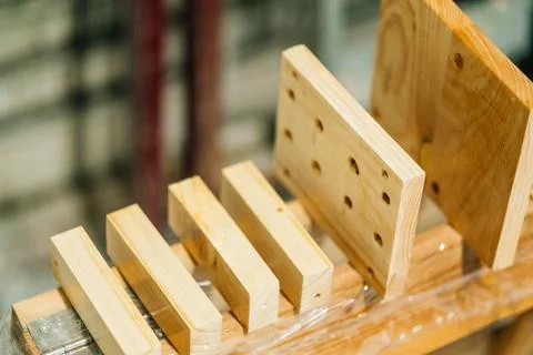 Wood from a carpentry workshop ready for assembly Stock Photos