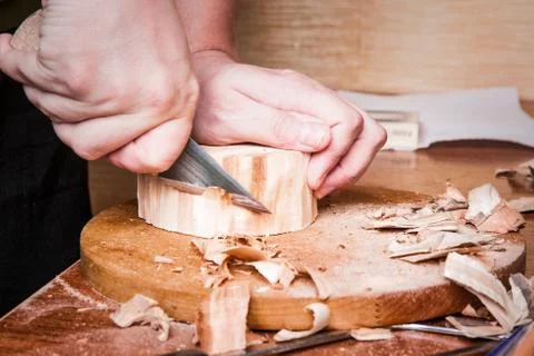 Wood carving process Stock Photos