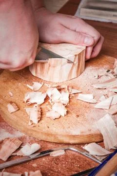 Wood carving process Stock Photos