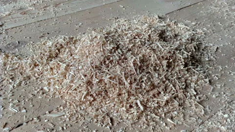 Wood chips on board craft process carpenter Stock Footage 94144926