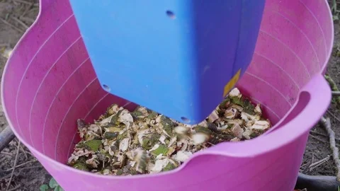 Wood chips falling into a basket Stock Footage 85067769