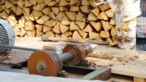 Wood chopping fresh birch logs Stock Footage