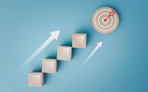 Wood cube block stacking with icon.Concept of business strategy and goal ac.. Stock Photos